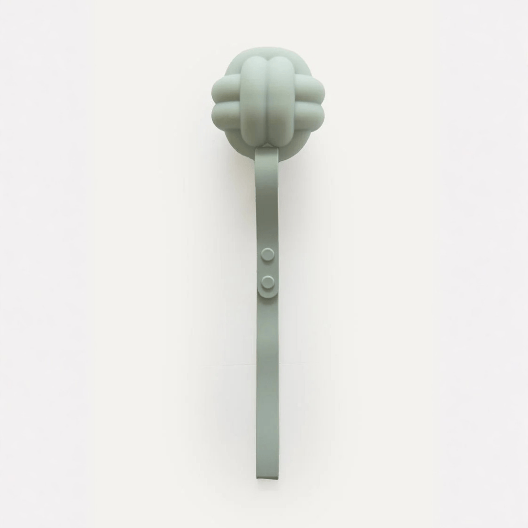 Sage green silicone knot ball dog toy on adjustable tether strap with snap buttons, maxbone Enrichment