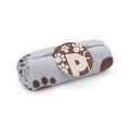 Rolled grey fleece dog blanket with brown paw print pattern, PetFace