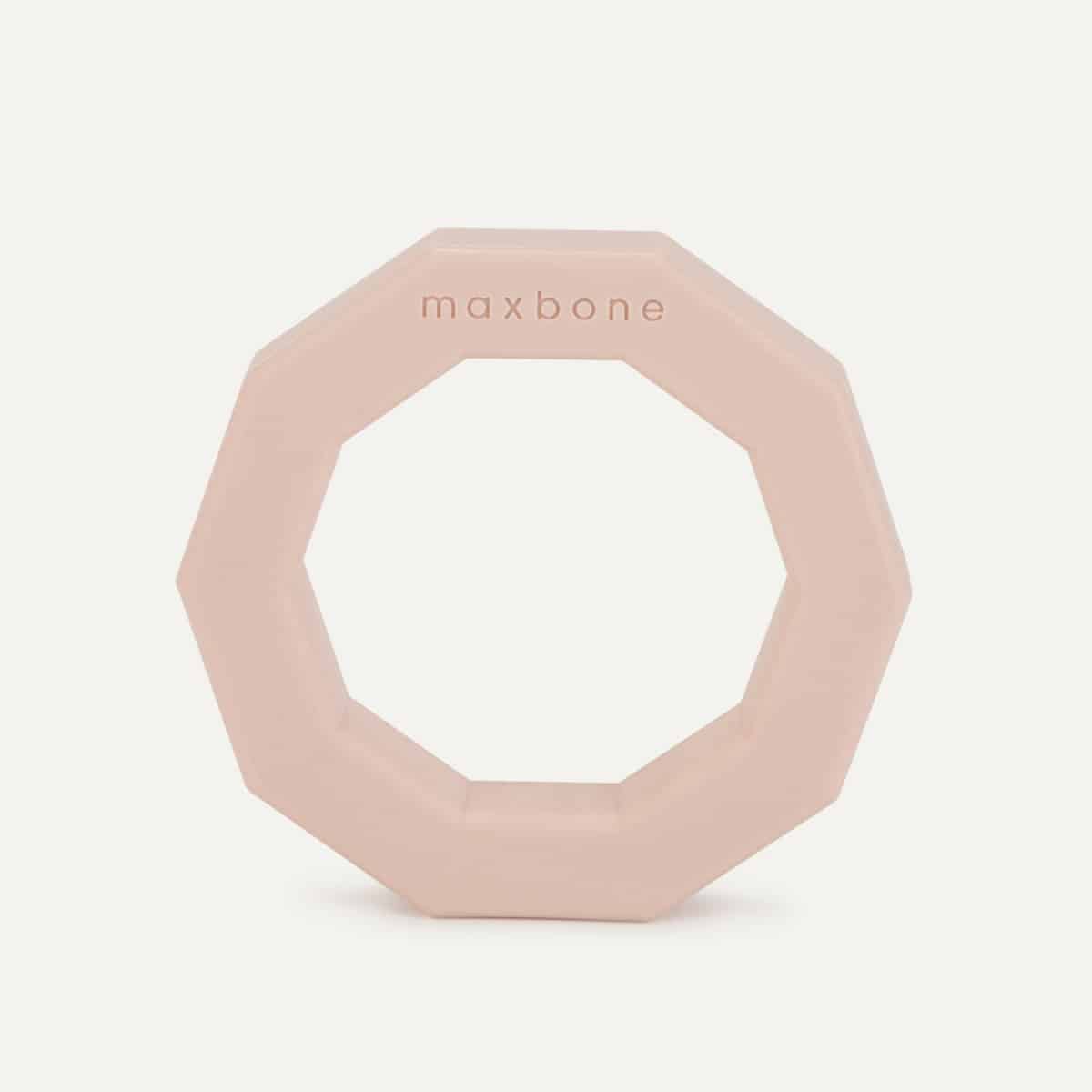 Pale pink rubber decagon ring dog chew toy, maxbone