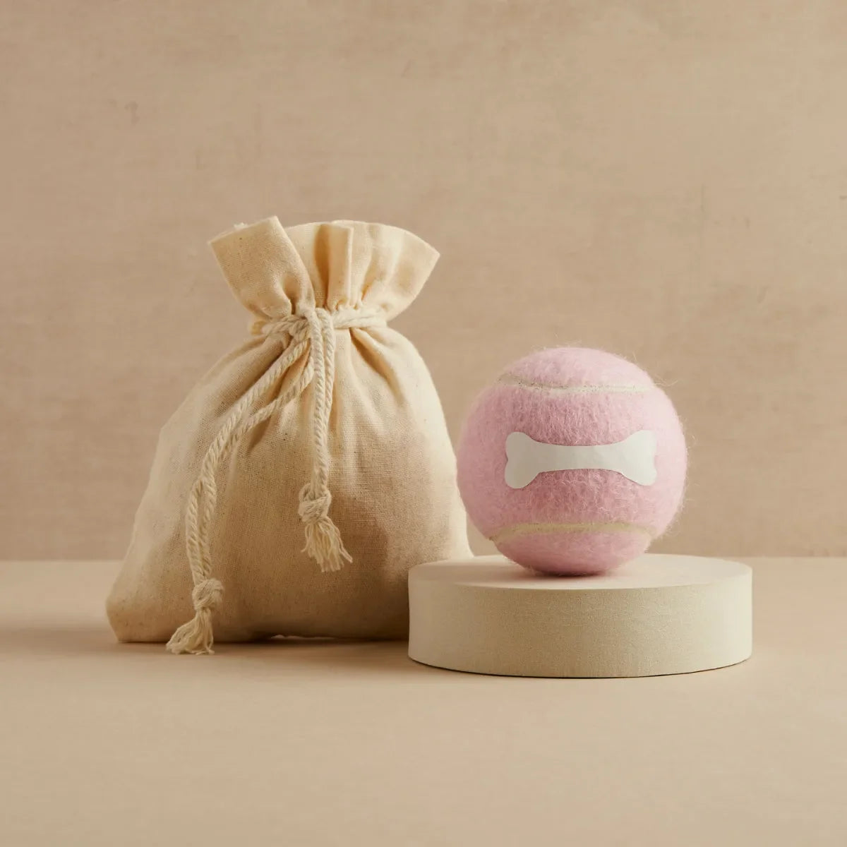 Candy pink tennis ball with bone design and linen bag, Pet Hamper