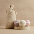 Three tennis balls in lavender, cream and pink with bone design and linen bag, Pet Hamper