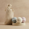 Three tennis balls in blue, cream and lavender with bone design and linen bag, Pet Hamper