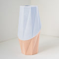 Blue and pink geometric vase-shaped dog treat filler toy, The Ubbe