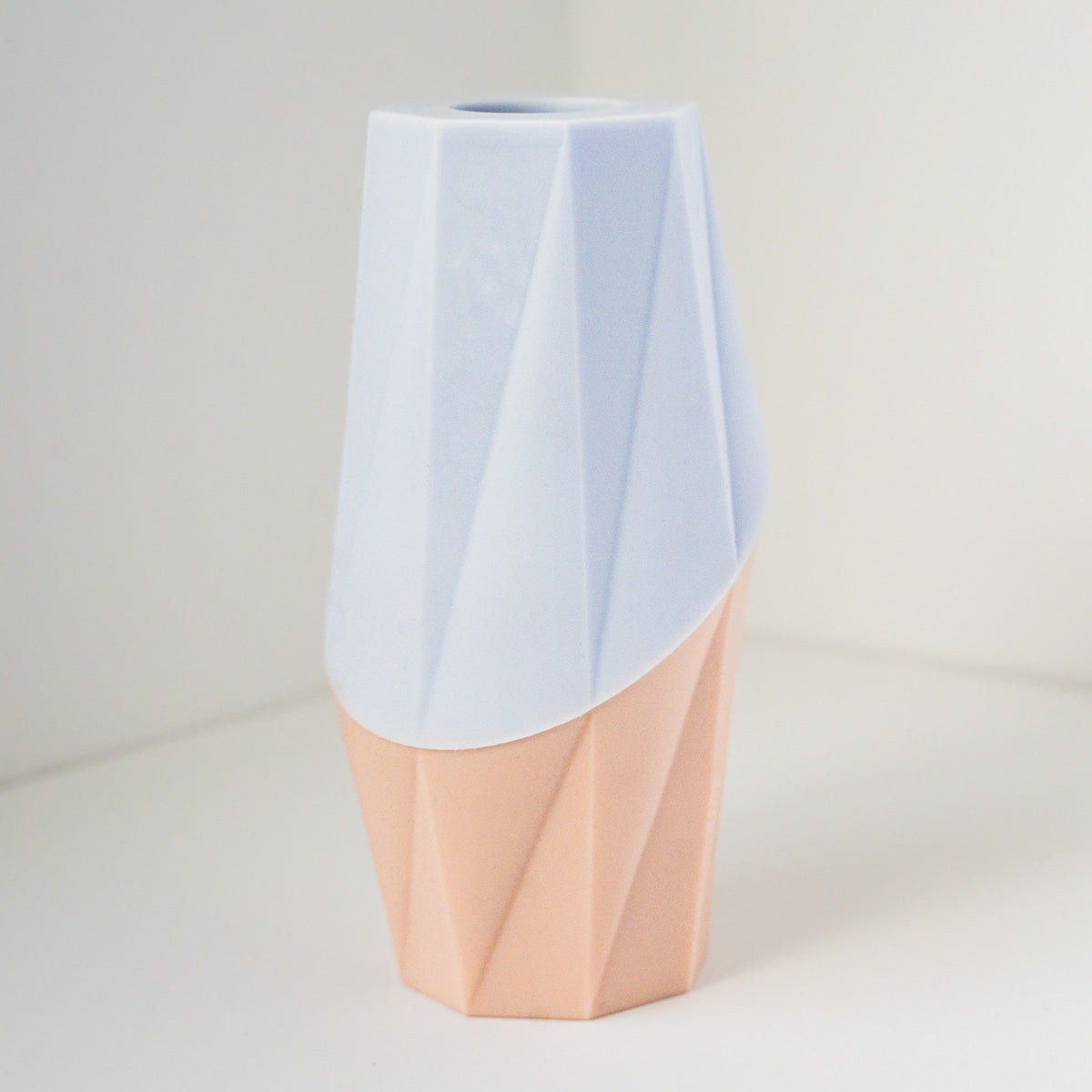 Blue and pink geometric vase-shaped dog treat filler toy, The Ubbe