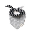 Grey dog bandana with white ghost print pattern and striped tie