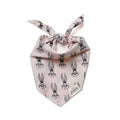 Cream dog bandana with cartoon rabbit face print pattern