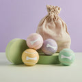 Four pastel colour tennis balls with bone design and linen bag, Pet Hamper